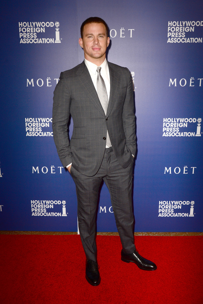 Channing Tatum cleans up in a gray windowpane suit from Italian fashion house Gucci.