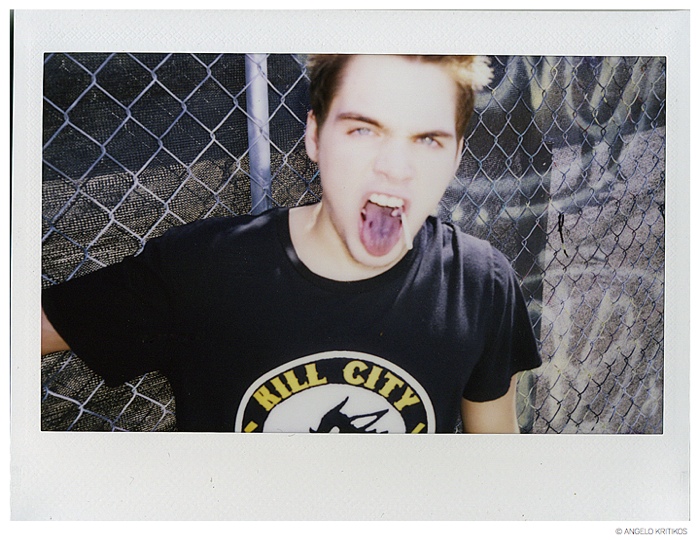 Dylan wears t-shirt Kill City.