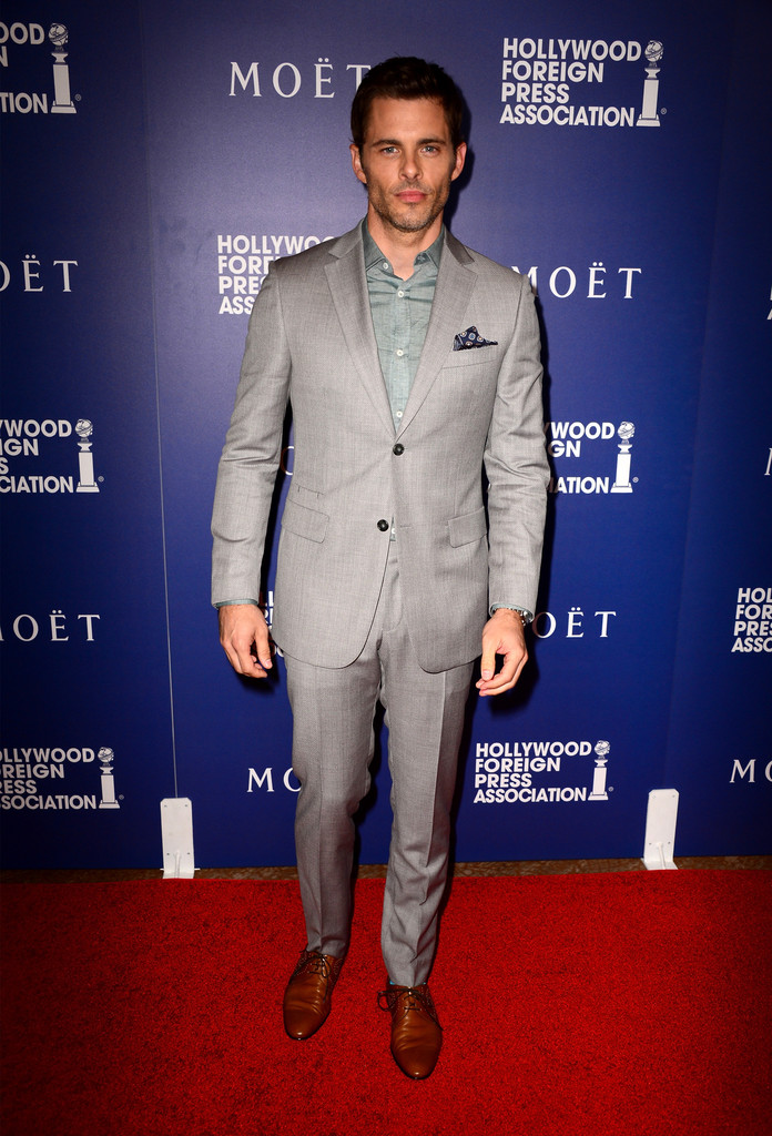 James Marsden charms in a gray two-button notch lapel suit from Italian label Z Zegna.