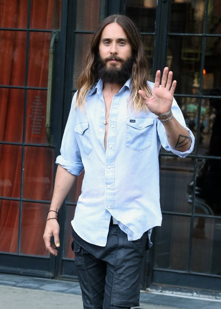 Jared Leto wears a light washed denim shirt as he heads out to run errands in New York City on August 14th.