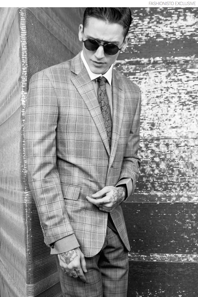 Leebo wears shirt and suit Duckie Brown, sunglasses and vintage tie stylist's own.