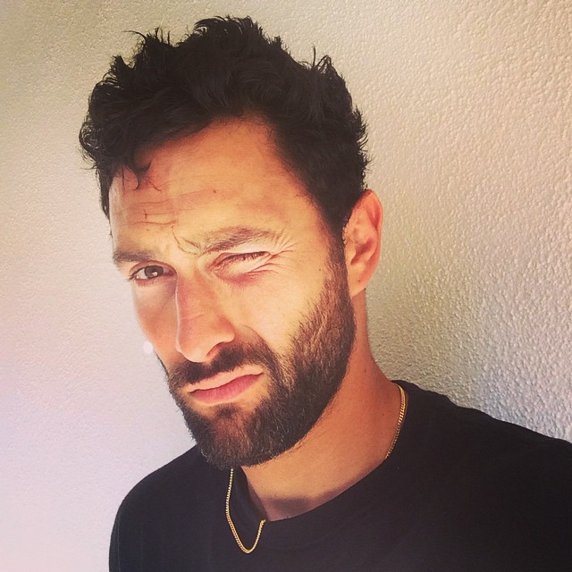 Noah Mills makes his best i-D face.