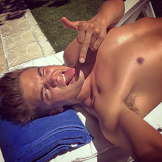 River Viiperi poses a playful photo of him enjoying his summer