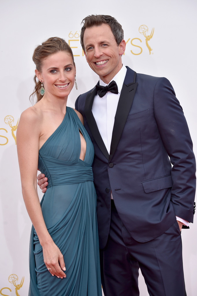 Host of this year Emmys, Seth Meyers and his wife Alexi Ashe. The late-night host went for a dapper tuxe in midnight blue.