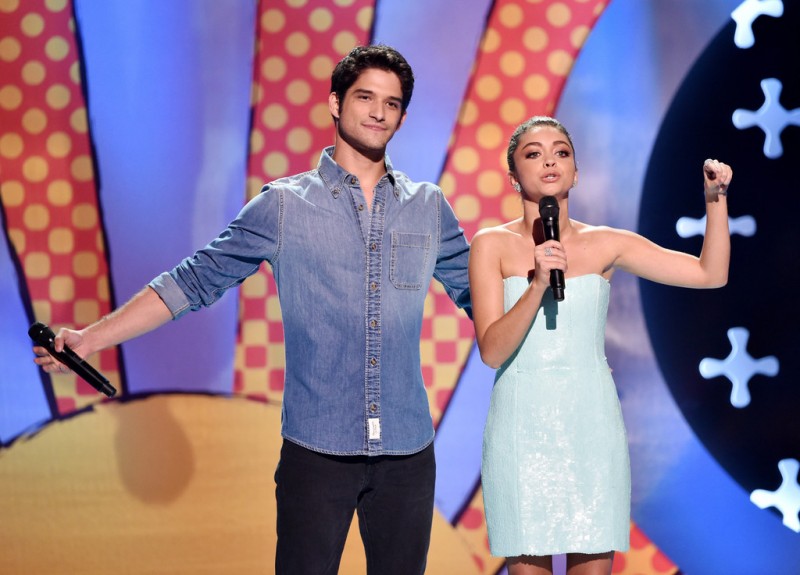 Tyler Posey keeps things casual in an Abercrombie & Fitch denim shirt as he joins co-host of the night Sarah Hyland.