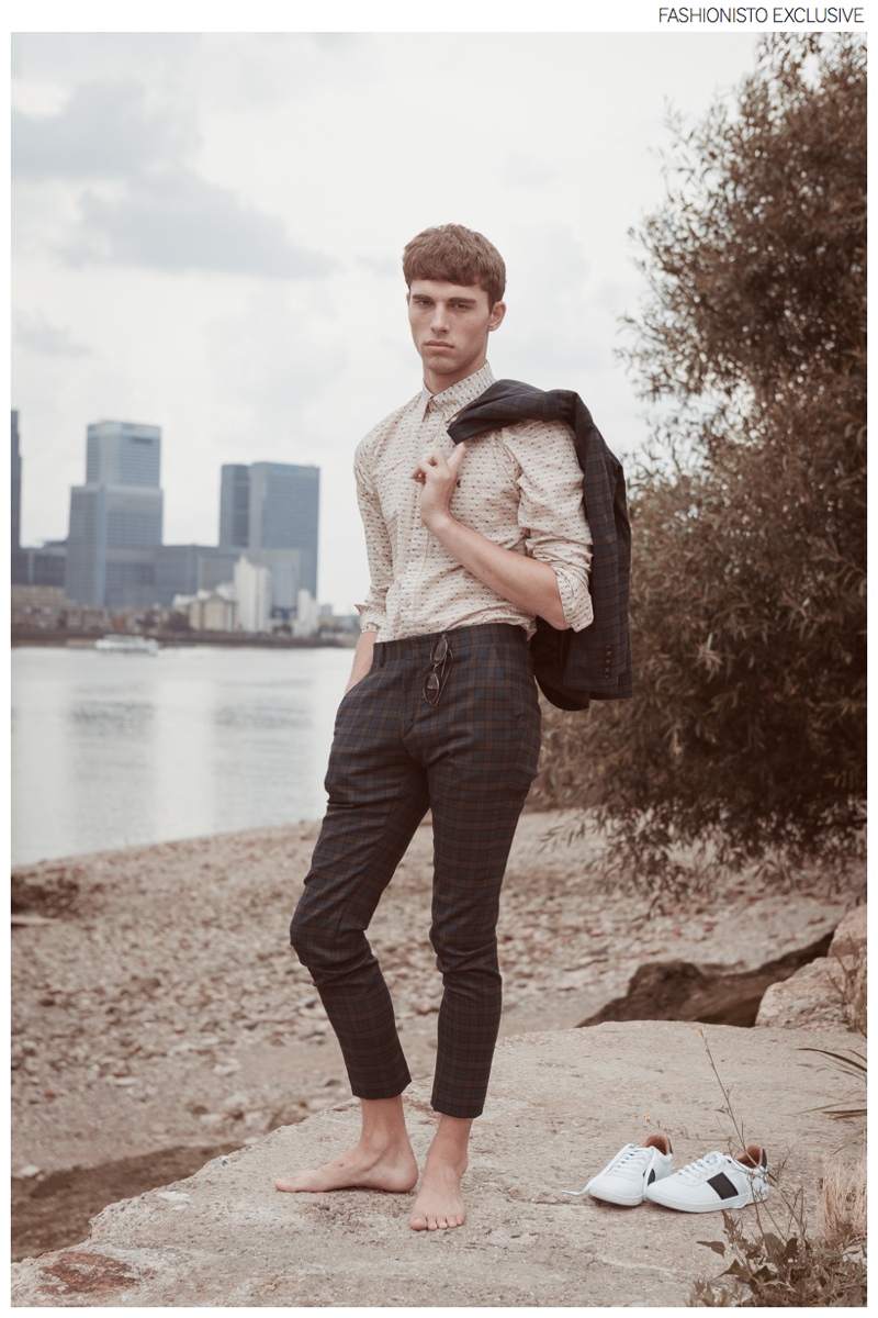 Yarik wears suit ASOS, shirt Gabicci, sunglasses stylist's own and shoes Fred Perry.