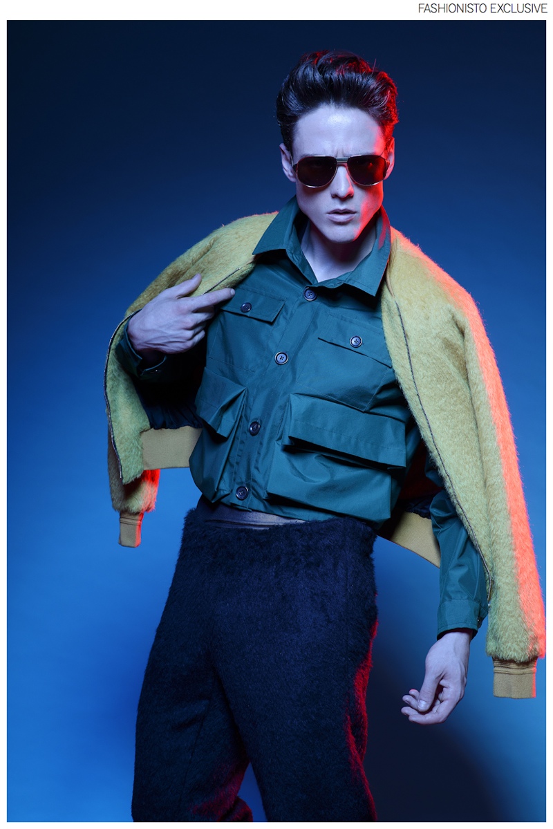 Dustin wears bomber jacket, crop jacket and trousers Andrea Incontri, t-shirt Archivio Guerrini, vintage sunglasses A.N.G.E.L.O. and boots Dirk Bikkembergs.