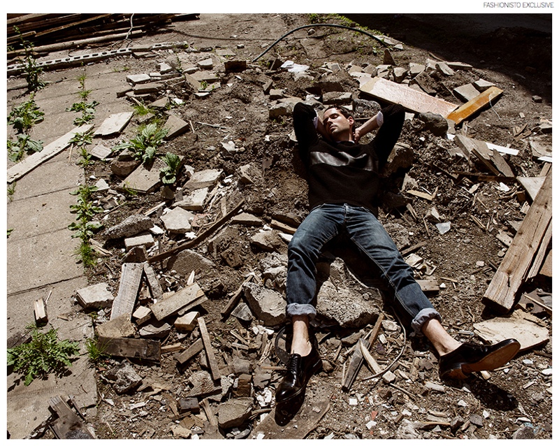 Isaac wears shirt Comme des Garçons Play, sweater La Marque, jeans diesel and shoes Saint Laurent by Hedi Slimane.