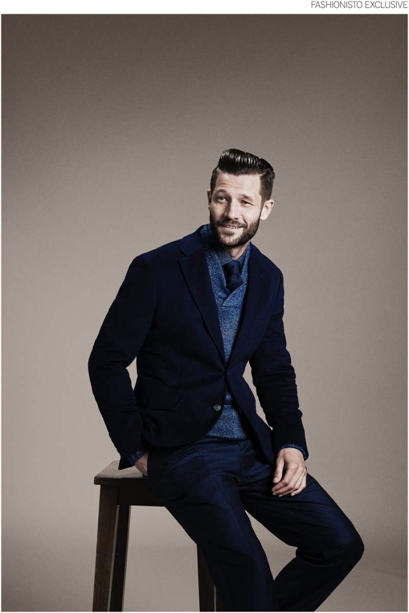 John wears blazer Hackett, sweater John Varvatos, tie Gieves & Hawkes, shirt and trousers Richard James.