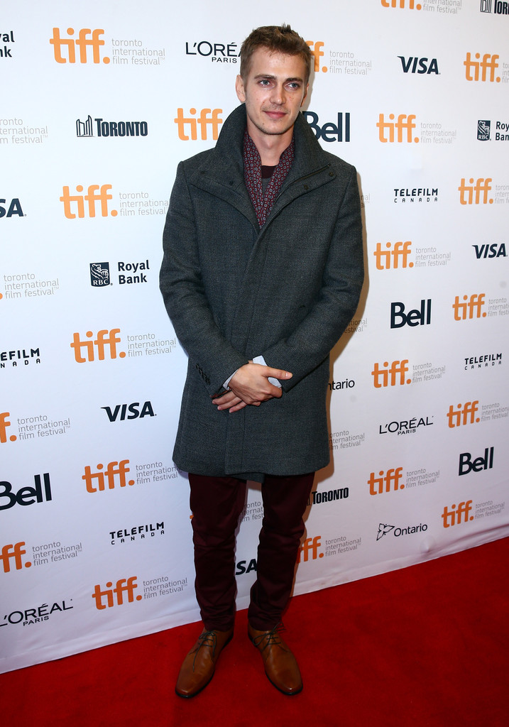 Hayden Christensen touched down in Canada for the Toronto International Film Festival. Attending the premiere of 'American Heist' on September 11th, Christensen was dapper in a charcoal wool-blend coat and skinny burgundy pants, paired with brown leather oxfords.
