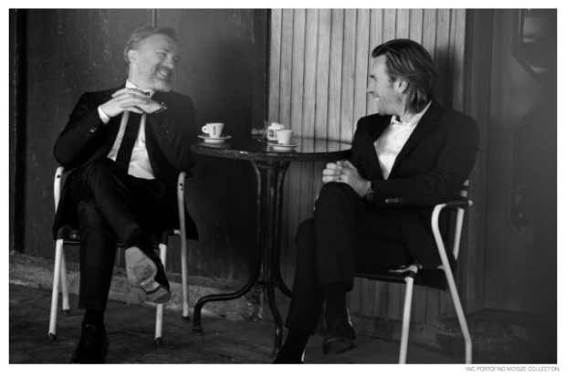 Christoph Waltz and Ewan McGregor enjoy a chat over a warm drink.