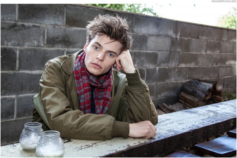 John wears scarf Jacqueline Rousseau and jacket US Army.