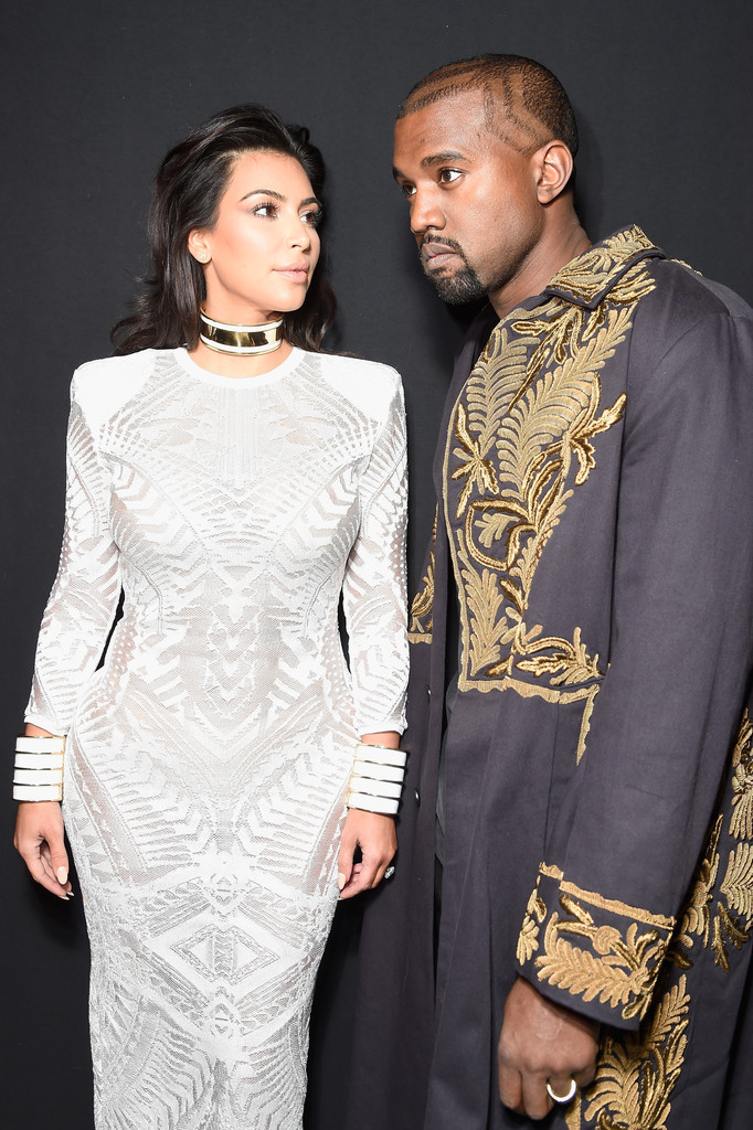 Kanye Wears Dries Van Noten Embroidered Coat to Balmain Spring 2015 Show | Fashionisto