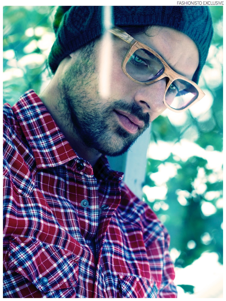 Michael wears shirt Diesel, glasses Wood Fellas and beanie Colmar.