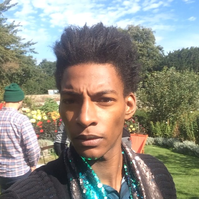 Ty Ogunkoya takes a selfie on a beautiful day outdoors.