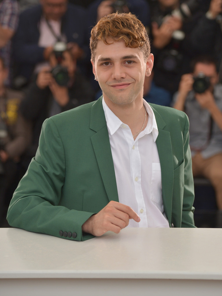 Attending a photocall for 'Mommy' on May 22, 2014 during the Cannes Film Festiva, actor Xavier Dolan was quite the vision in a green suit from KRISVANASSCHE.
