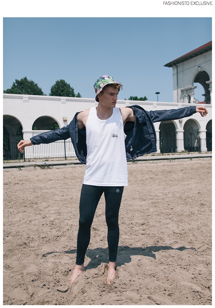 Zak wears jacket Patrik Ervell, tank Stussy, tights Topman Sport and bucket hat stylist's own.