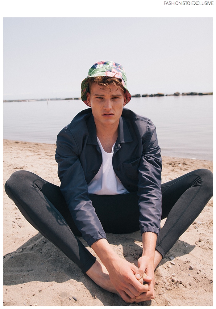 Zak wears jacket Patrik Ervell, tank Stussy, tights Topman Sport and bucket hat stylist's own.