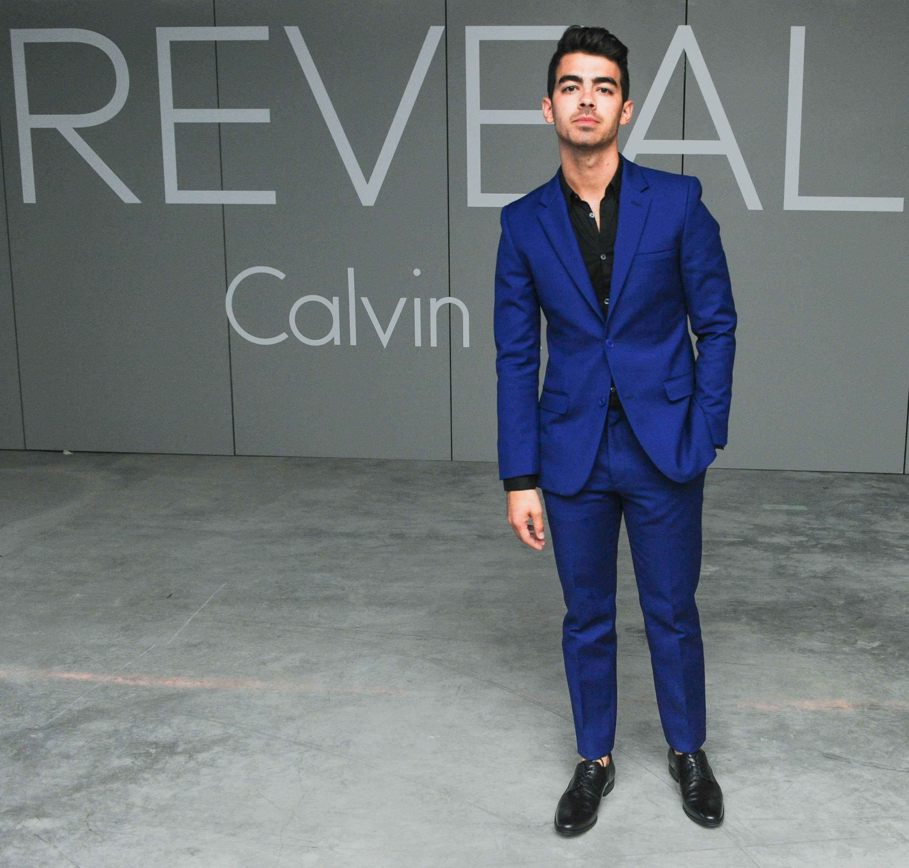 Joe Jonas Celebrates Calvin Klein Reveal Launch in Stunning Blue Suit – The  Fashionisto