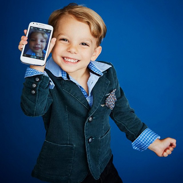 Always active on Instagram, Giorgio Armani shared an image that's irresistible to pass up. Shooting a special Armani Junior cover for Vogue Bambini, the Italian fashion house had a chance to show its fine tailoring in an infectious miniature style.  Future top model in the making?