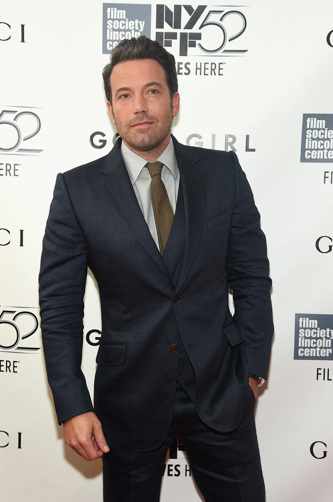 Attending the Opening Night Gala Presentation and world premiere of 'Gone Girl' during the New York Film Festival on September 26 2014, actor Ben Affleck was at his sartorial best in a charcoal three-piece suit, paired with a skinny brown tie.