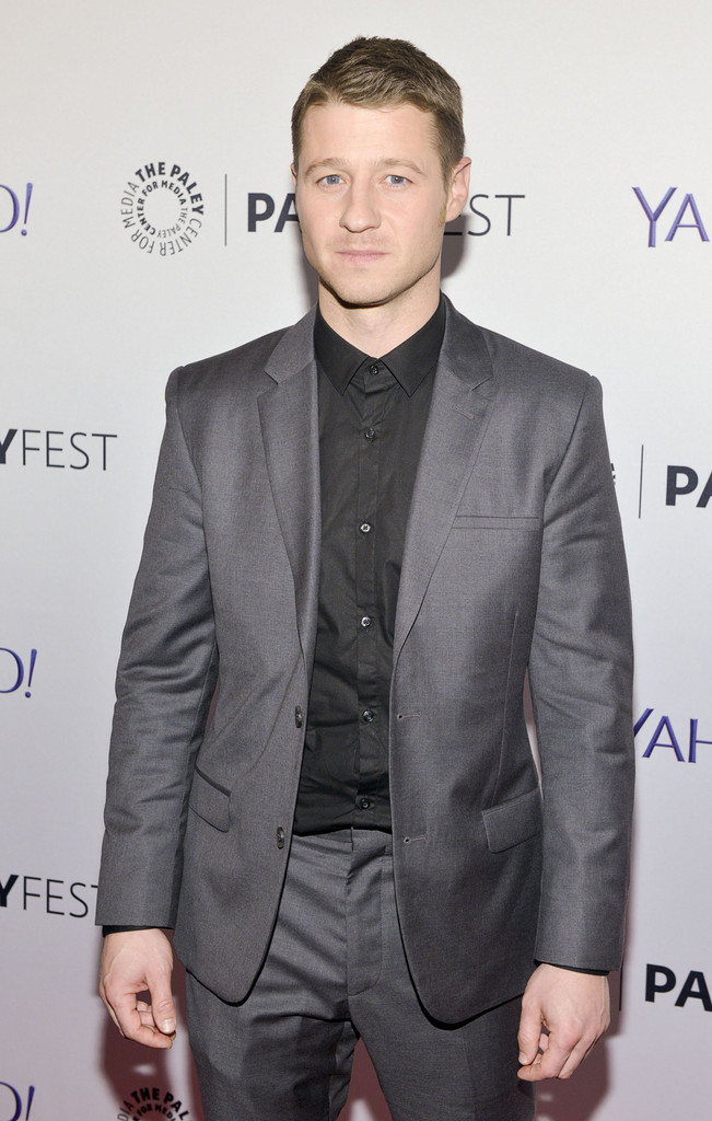'Gotham' star Ben McKenzie cleaned up nicely in a charcoal gray suit with a black dress shirt for the 'Gotham' PaleyFest New York Panel on October 18th. McKenzie completed his tailored suit with a pair of trainers.