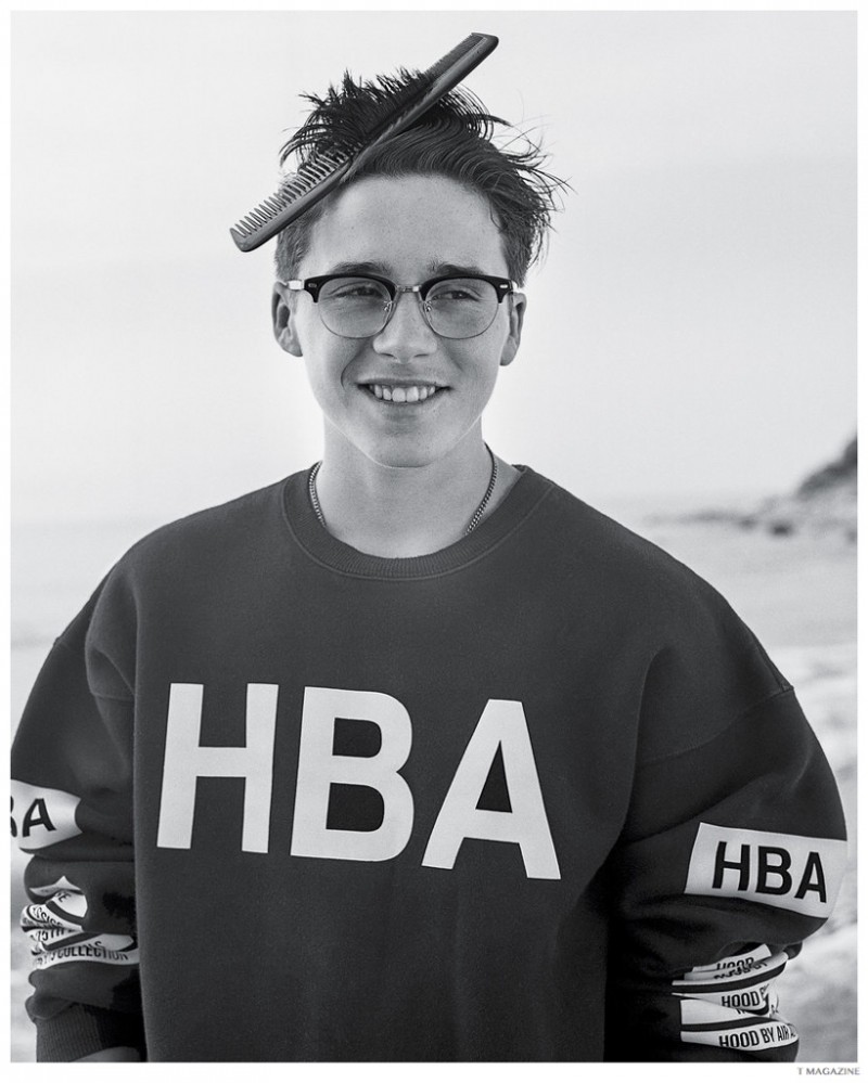 Brooklyn Beckham models sweatshirt Hood by Air and glasses Moscot.