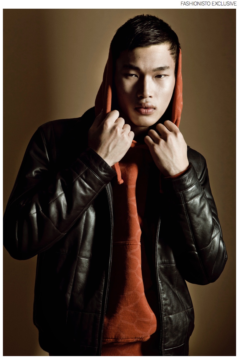 Chun wears leather jacket Hugo Boss and hooded sweater Stone Island.