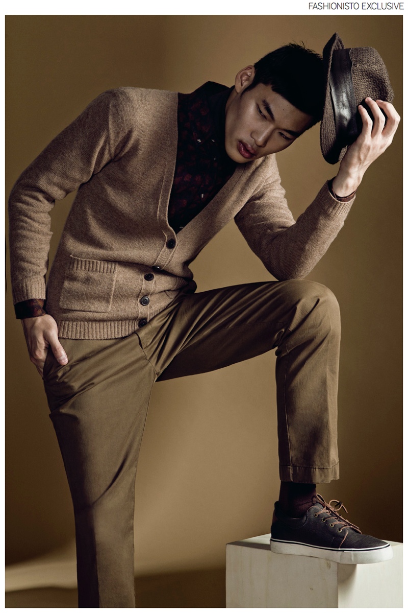 Chun wears cardigan Levi's, shirt Harmont and Blaine, turtleneck sweater BOSS by Hugo Boss, trousers Hackett, shoes Levi's and hat stylist's own.
