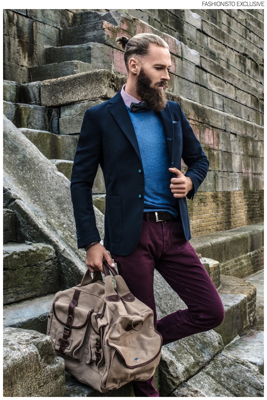 Laviniu wears shirt Roosen, jacket Manuel Ritz, pants Cinquetasche, bow-tie Rosi & Ghezzi, pullover Zanieri and bag Barbour Steve McQueen.