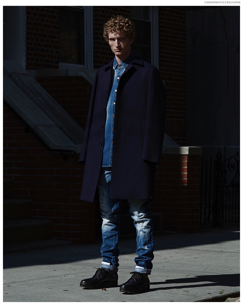 Luke wears denim shirt and jeans Off-White, wool overcoat and shoes Marni.