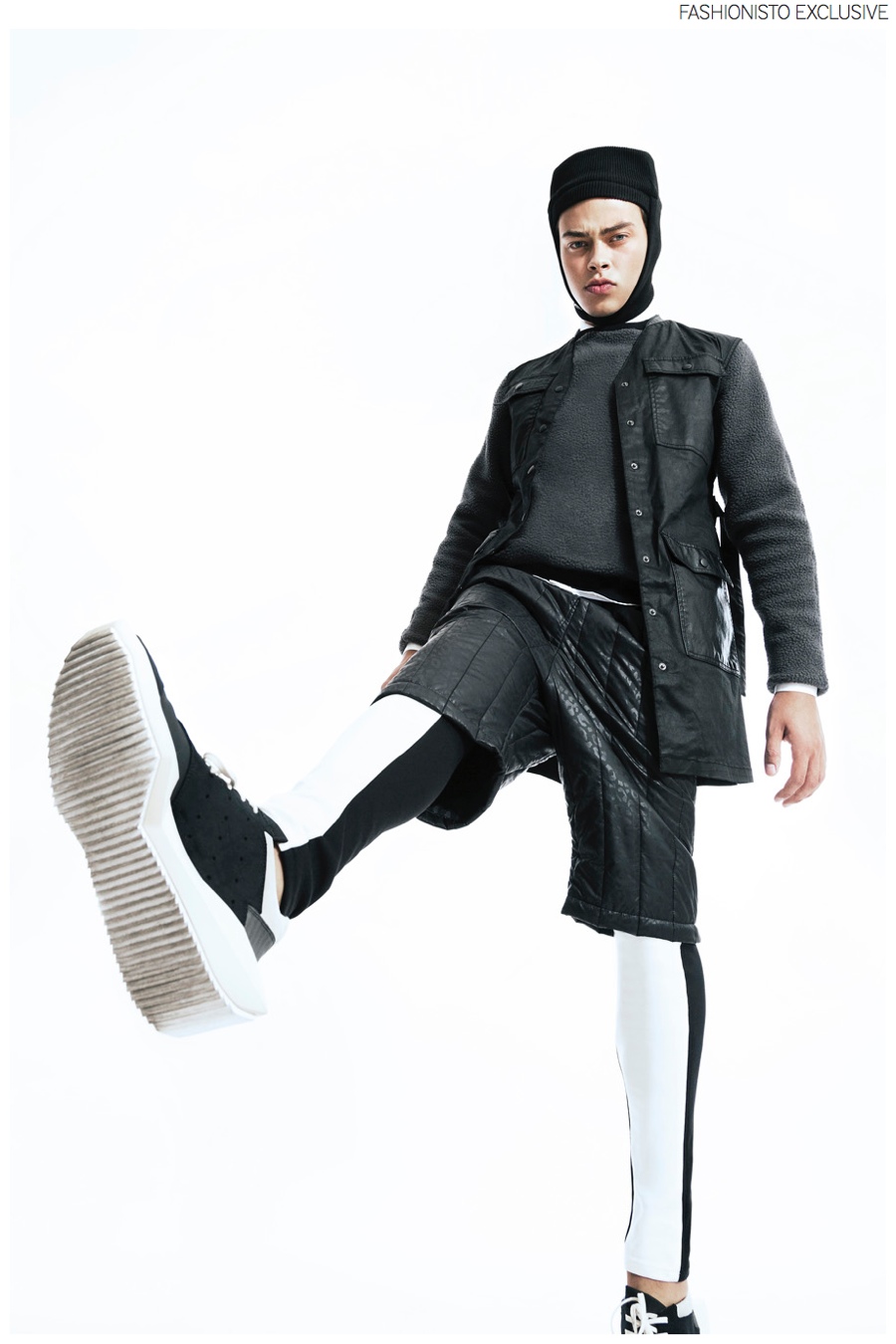 Tobias wears white shirt Matinique, black safari vest Prairie for Weekday by Matthew Ames, sneakers Rick Owens, hat Henrik Vibskov, fleece, leggings and thermo shorts Bibi Chemnitz.