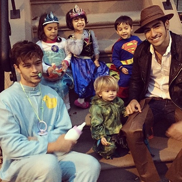 Francisco Lachowski and Francisco Escobar take the kids trick or treating.