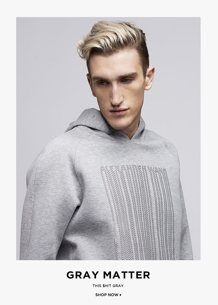 Model AJ English wears Alexander Wang Laser-cut Logo Hoodie