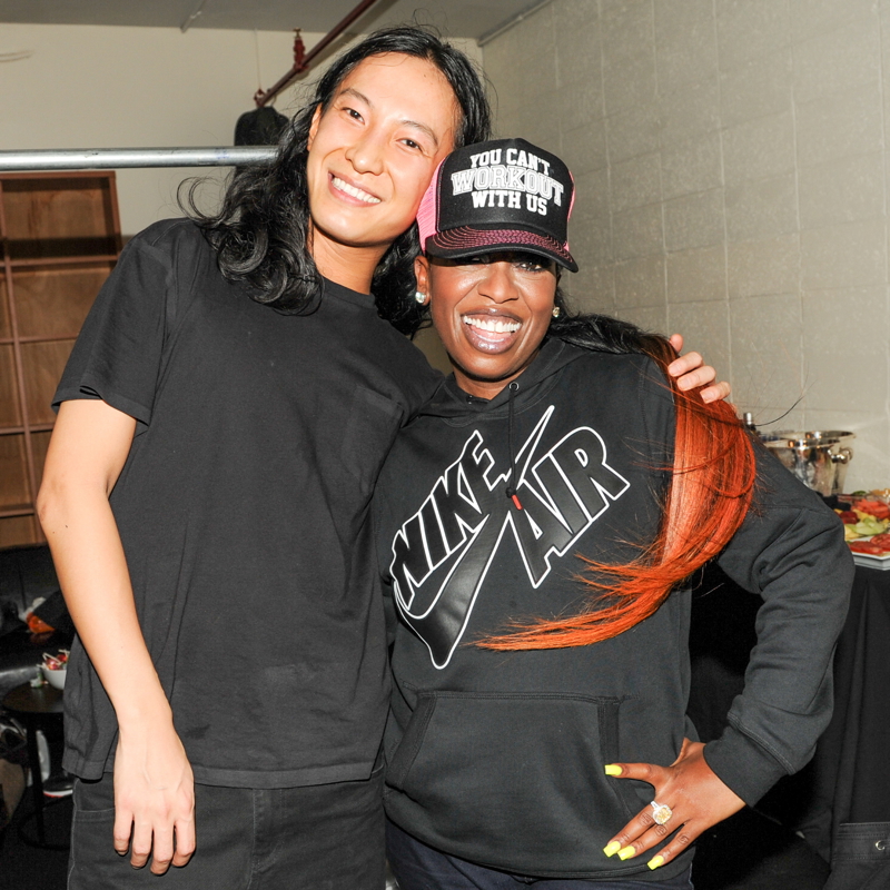 Designer Alexander Wang poses for a photo backstage with Missy Elliott, who performed for the event.