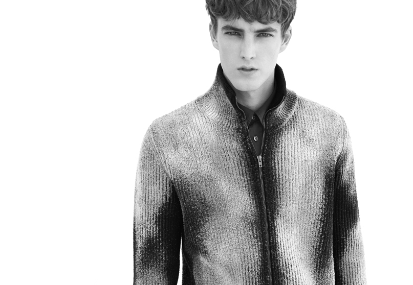 James Smith is cool and composed in a graphic cardigan from Maison Martin Margiela for the Rock Luxe trend.