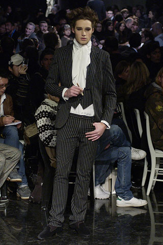 Fall 2006: Presenting a his 'n' her collection, the season was all about bringing a glam and elegant edge to menswear.