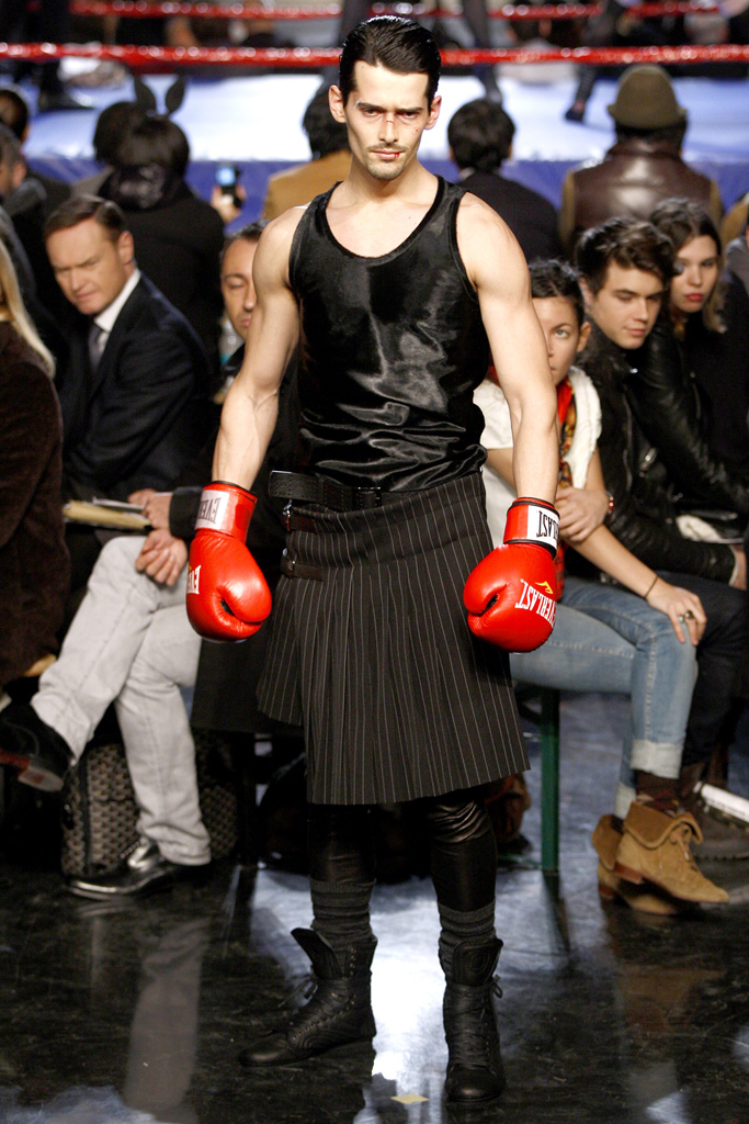 Fall 2010: A fan of the kilt, Gaultier brought the classic back, married to the masculine sport of boxing.