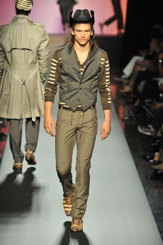 Spring 2009: Gaultier looks west with impeccable fits and a conservative color palette.