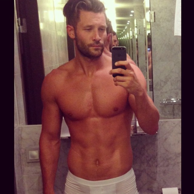 John Halls posts a shameless bathroom selfie.