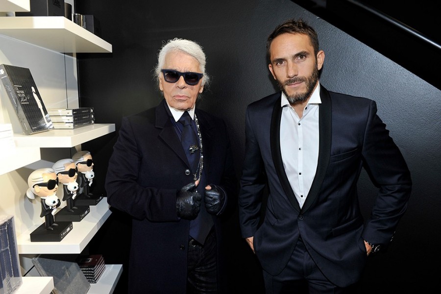 Karl Lagerfeld poses for a photo with Sebastien Jondeau