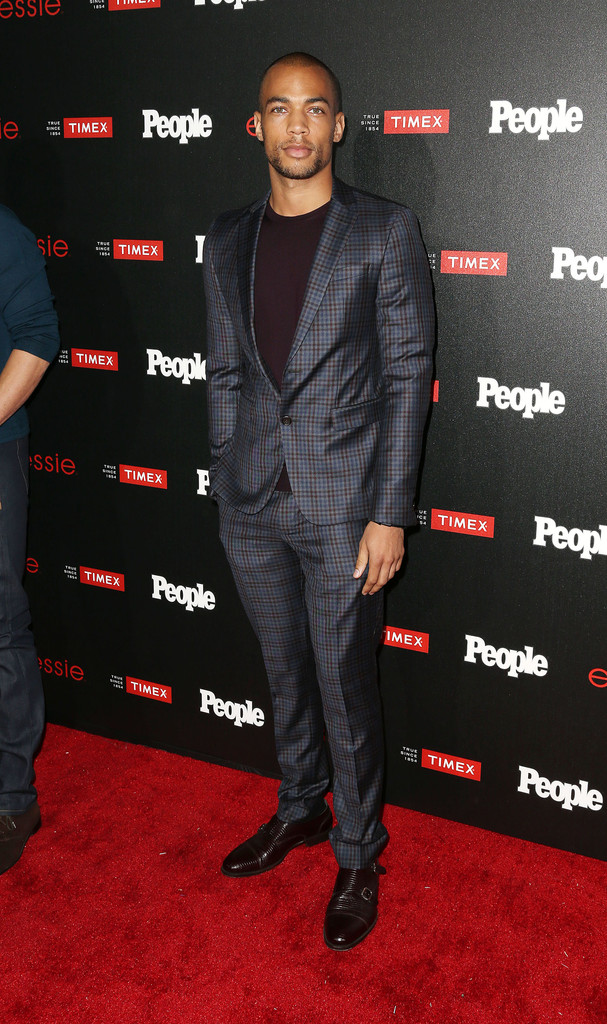 Attending People magazine's 'Ones to Watch' event on October 9, 2014 in Los Angeles, 'Gracepoint' actor Kendrick Sampson was a striking fall vision in a brown and purple plaid suit from SAND Copenhagen. The tailored number was kept casual and laid-back with a complementary plum sweater.