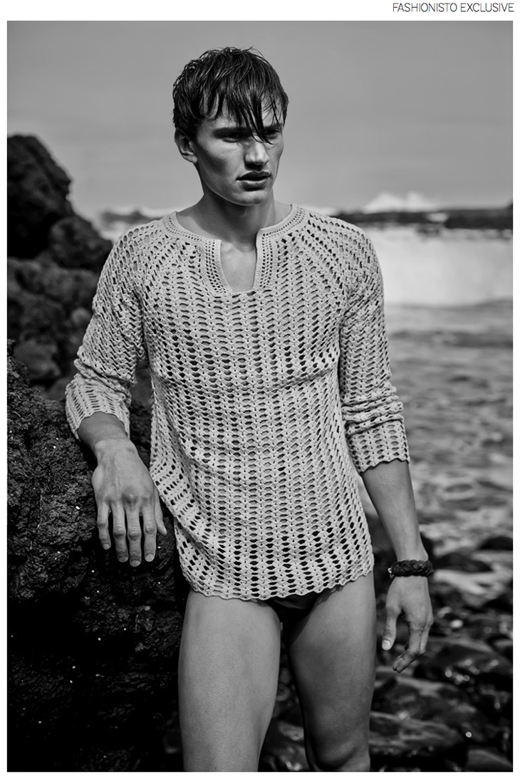 Levi wears knit Pin the Label, swimsuit Speedo and leather wrist wrap Ruby & Prankster.
