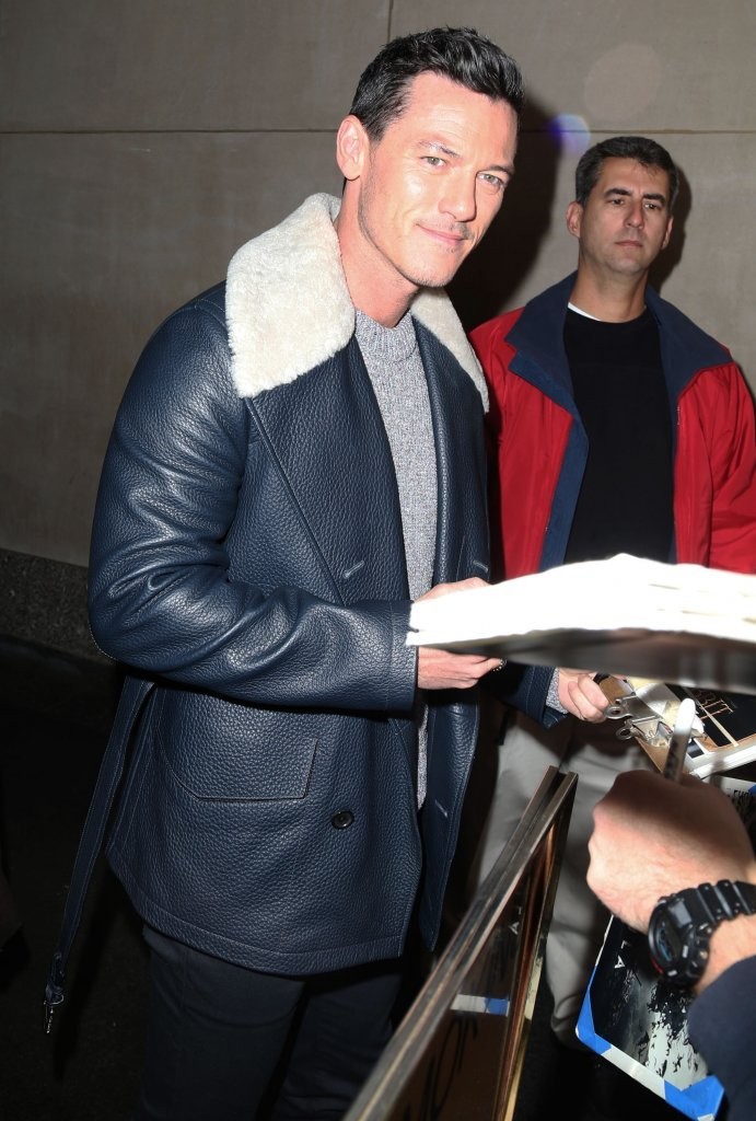 Earlier in the day, Luke Evans attended a taping of the 'Today' show, where he was captured outside in a luxe leather and shearling jacket.