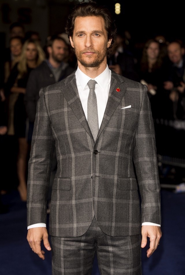 Touching down in London on October 29th for the premiere of 'Interstellar', Matthew McConaughey took a break from Dolce & Gabbana, departing from the usual and sporting a Prince of Wales check suit from Kent & Curwen. McConaughey completed his look with a pair of leather dress shoes from Tod's.