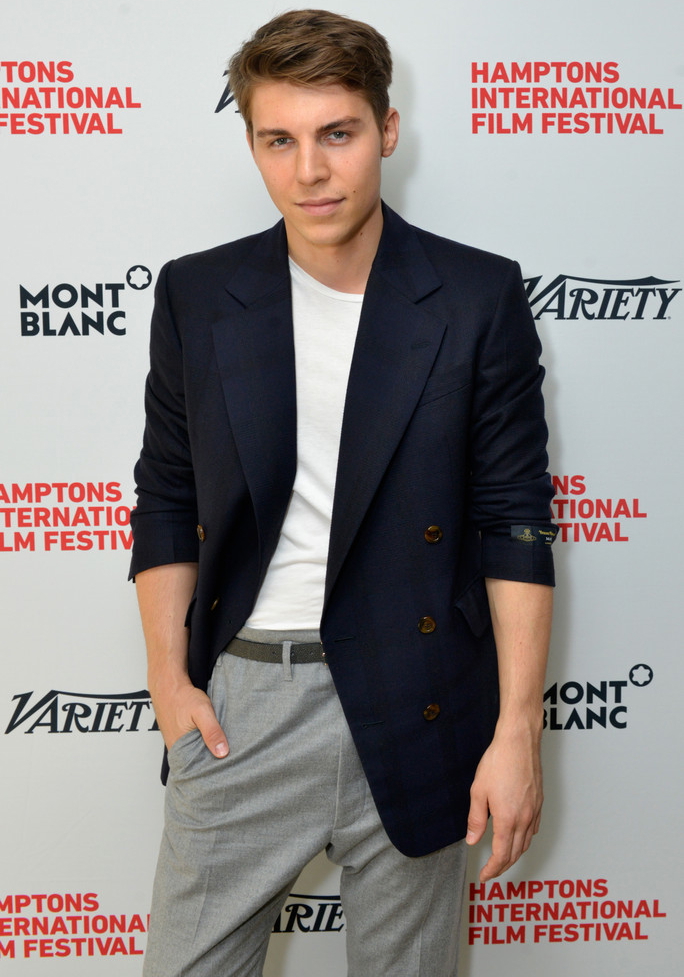 Attending Variety's '10 Actors to Watch Brunch' with Hilary Swank on October 12, 2014, actor Nolan Gerard Funk played it cool and chic in a Vivienne Westwood navy double-breasted jacket with gray 'James Bond' trousers.