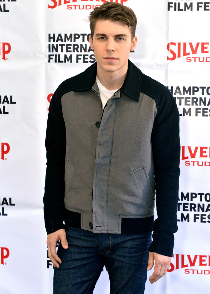 Attending the Chairmans Reception during the Hamptons international Film Festival on October 11, 2014, actor Nolan Gerard Funk was a casual vision in a black and gray color block blouson, paired with dark wash denim jeans. See inspired jackets below to achieve your own casual color block look.