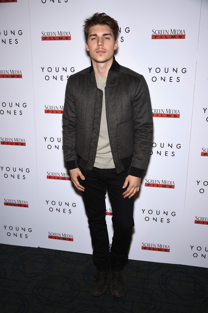 Attending the New York premiere of 'Young Ones' on October 9, 2014, actor Nolan Gerard Funk kept it casual in a dark ensemble, created around a quilted bomber jacket from Richard Chai's fall-winter 2014 collection.