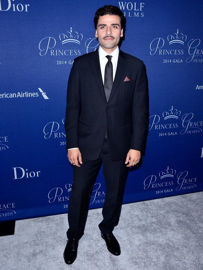 Showing off his new mustache, actor Oscar Isaac attended the 2014 Princess Grace Awards Gala on October 8, 2014 in Beverly Hills. For the occasion, Isaac wore a tailored suit from Ermenegildo Zegna Couture, which is helmed by head of design, Stefano Pilati.