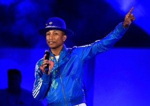 Pharrell Performs in Chanel T-Shirt & Custom Adidas Blue Leather Bomber ...